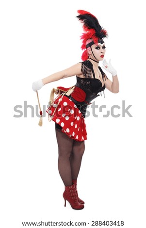 Pretty bourlesque girl in fancy costume with plumage over white background