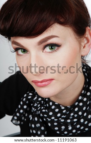 stock photo Portrait of beautiful redhaired girl with makeup in Audrey