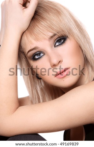 stock photo Portrait of beautiful blond teen girl with stylish makeup