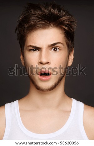 stock photo Portrait of young attractive sexy boy with crazy expression