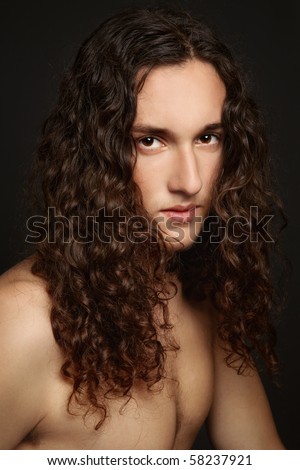 Long Curly Hair Man. beautiful long curly hair