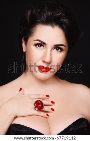 Beautiful plus-size busty woman with stylish make-up