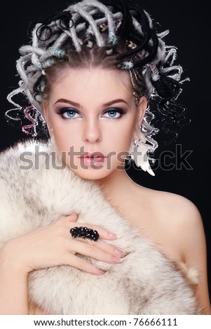 stock photo Beautiful young sexy girl with fancy hairstyle of dreads and 