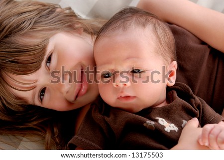 Latest  Brother on Big Sister Holding Her Baby Brother Stock Photo 13175503