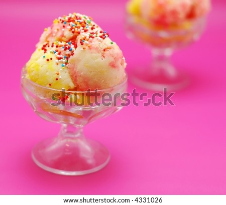 Peach and strawberry ice cream with candies