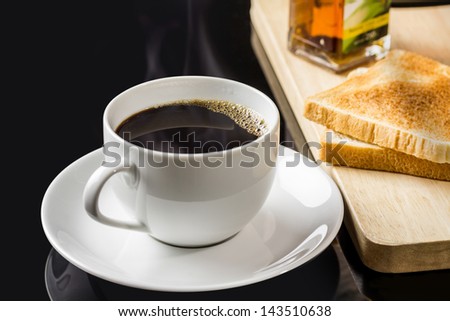 Cup of coffee and breads