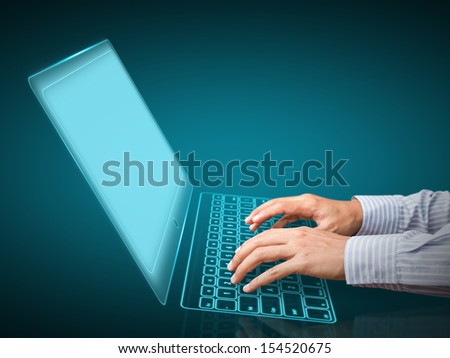 Man\'s hands typing on keyboard