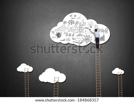 Businessman climbing ladder drawing idea on cloud
