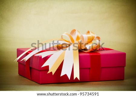 Red Gift box with gold ribbon