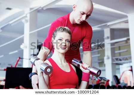 Girl training in fitness club