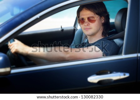 Young driver in the car
