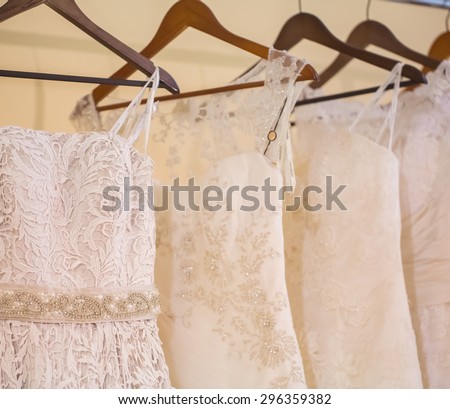 White Wedding Dresses in dress store.