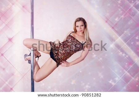 Girl making figure of pole-dance sport