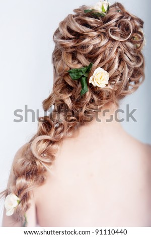 Beautiful blond bride hairstyle photo in studio