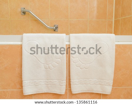 A towel on the rack in the bathroom. microstock photos