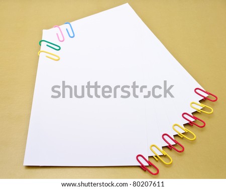 Color stickers and paper clips. Isolated on white background
