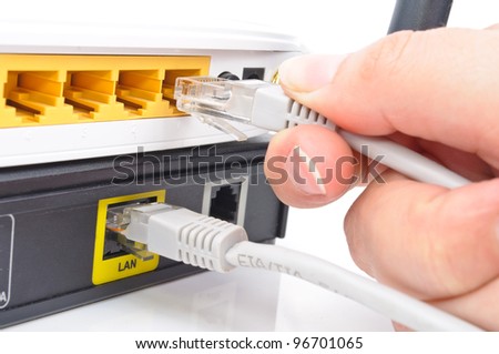 Connect the cable to the network switch. Close-up Photos