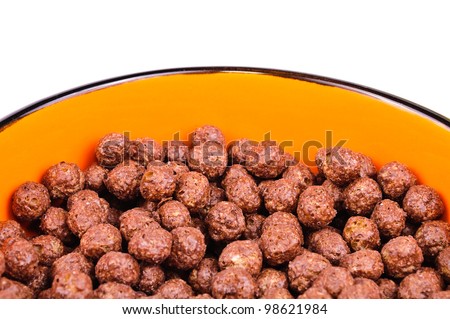 Breakfast cereals, chocolate balls. The photo on white background