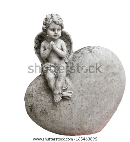 Angel sitting on a heart Angel sitting on a heart