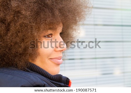 Girl with afro hair cut