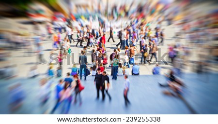 Hectic in the city - people in a town with zoom effect