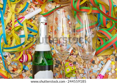 Party background with confetti, steamer and champagne