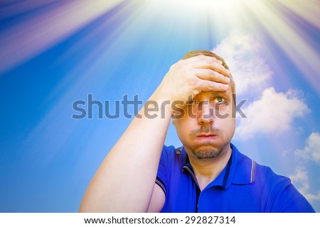 Man sweating on a hot summer day