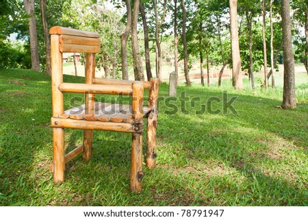 one chair on green field