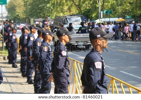 BANGKOK - JAN 25: Police Commandos guard a barricade on Makkhawan Bridge outside Government HQ on Jan 25, 2011 in Bangkok, Thailand. The Thai capital continues to see street protests and bomb alerts.