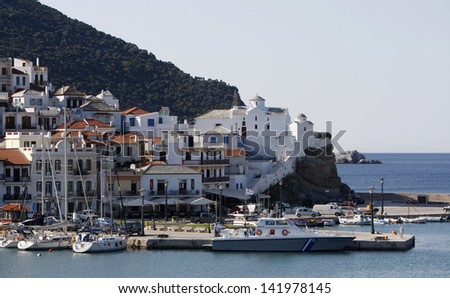 Skopelos town on the Island of Skopelos in Greece showing houses around the harbor