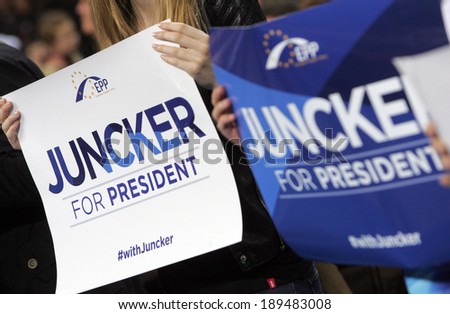 SOFIA, BULGARIA - APRIL 27: Supporters of EPP holds boards with name of candidate for the post of EC Pres Jean-Claude Juncker during opening of the European elect campaign on April 27, 2014 in Sofia.