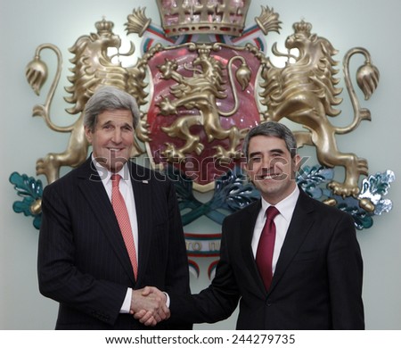 SOFIA, BULGARIA - JANUARY 15: Bulgarian President Rossen Plevneliev (R) welcomes US Secretary of State, John Kerry during their official meeting on January 15, 2015 in Sofia.