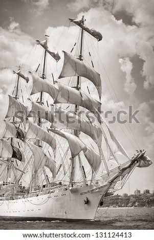 Old ship with white sales in black and white