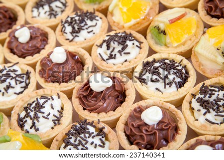 Small cupcakes with different stuffing, food catering