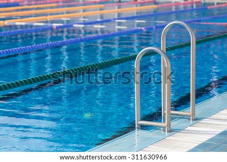 Detail from olympic swimming pool with swim lanes