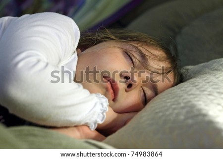 Sleeping child on couch