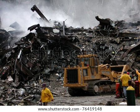 NEW YORK - SEPT 20 :  Workers search through  the debris at Ground Zero World Trade Centre on September 20, 2001 in New York.