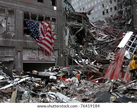 NEW YORK - SEPT 20 :  Flag on building across the street from Ground Zero World Trade Centre on September 20, 2001 in New York.