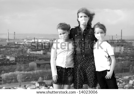 Portrait of a family against a grey city