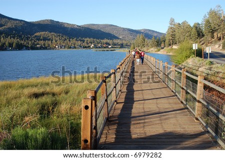 Elevated walkway over the lake of a wildlife preserve; Big Bear Lake, California