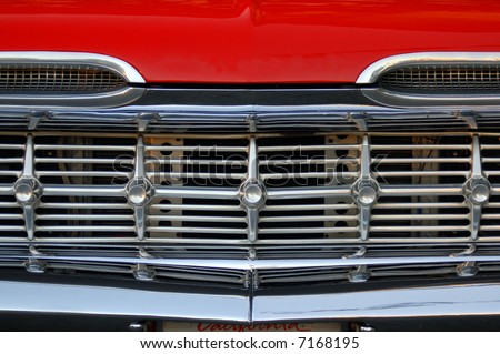 Front grille and bumper of an old car from the 1960's; San Bernardino, California