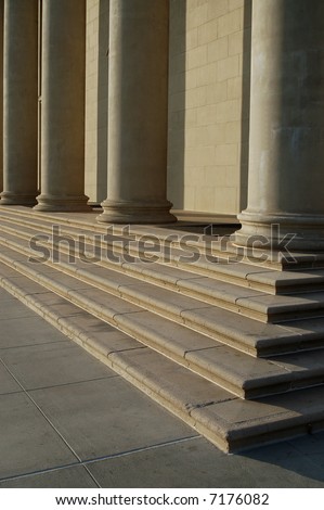Pillars and steps lit by setting sun; Redlands, California