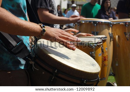 Percussionists playing drums; \
