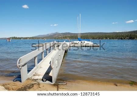 Boat dock on mountain lake; Big Bear Lake, California