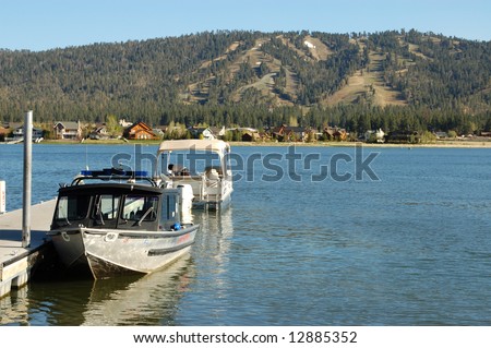 Boats docked on lake; Big Bear Lake, California