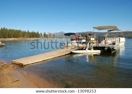 Boat dock on lake; Big Bear Lake, California