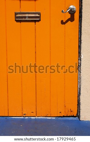 Orange wood door; Spanish Village Art Center; Balboa Park; San Diego, California