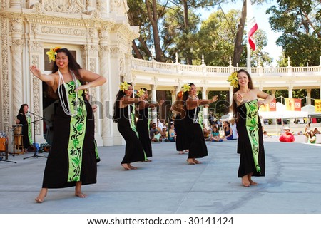 SAN DIEGO, CA - 19 APRIL: Hawaiian dance troupe entertain visitors at Earth Fair on 19 April 2009. The fair is a large annual event held at Balboa Park in San Diego.