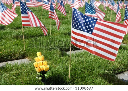 Fluttering American flags at grave sites; Riverside National Cemetery; Riverside, California