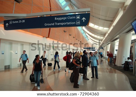 SAN JOSE, CA - JULY 29: Passengers in San Jose International Airport, July 29, 2010 in San Jose, California. Air travelers are facing higher ticket prices due to rising fuel costs for airlines.